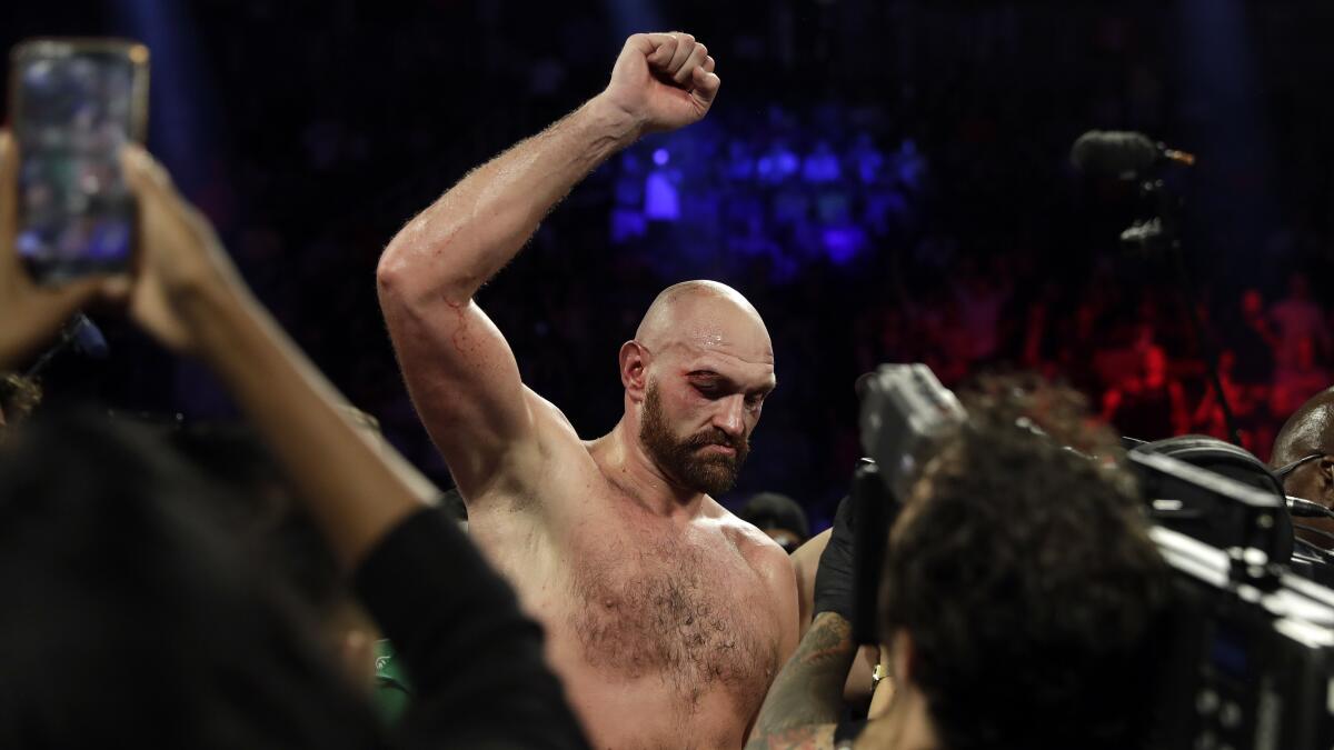 Tyson Fury celebrates after defeating Otto Wallin in a unanimous decision Sept. 14, 2019.