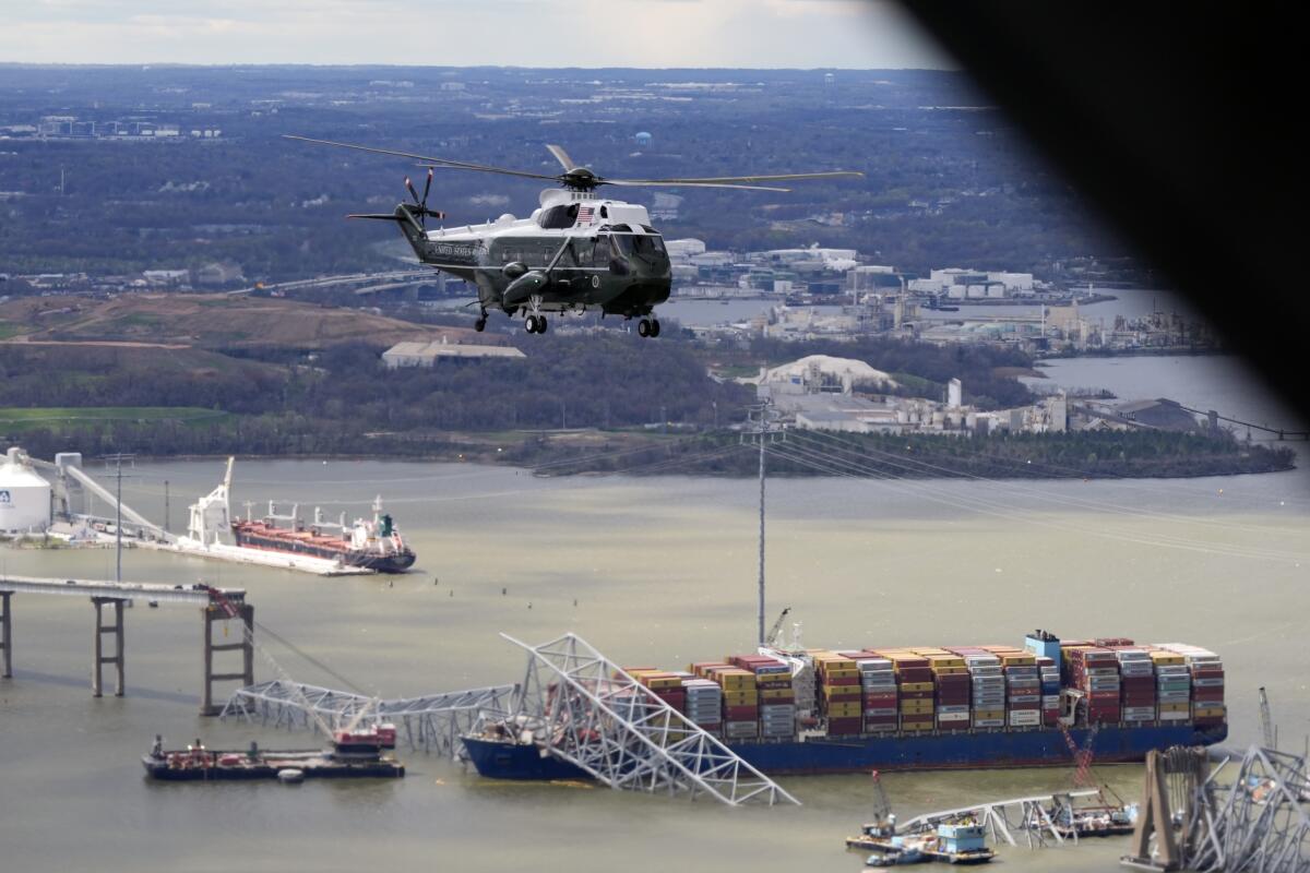 Marine One flies over the collapsed Francis Scott Key Bridge in Baltimore