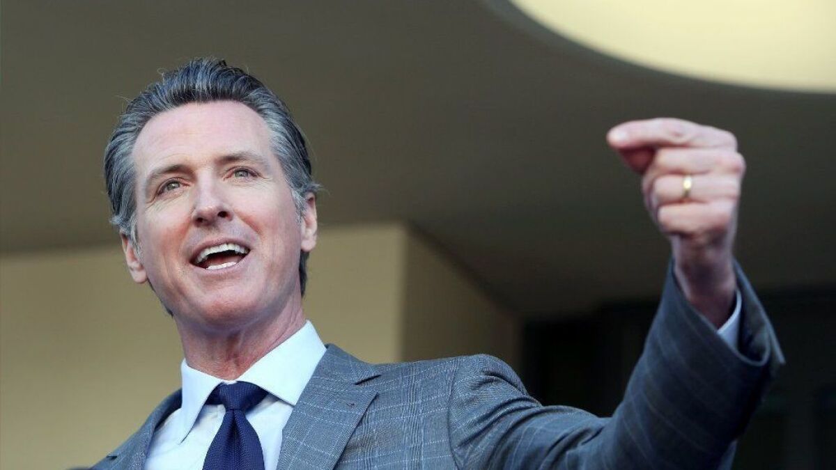 Gov. Newsom, shown in Long Beach on Feb. 19, has fast-tracked legislation requiring new transparency standards for charter schools.