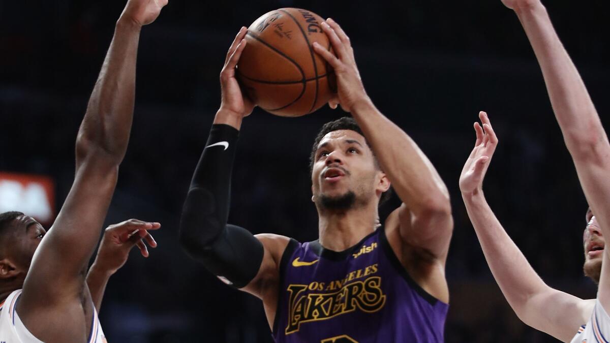 Lakers guard Josh Hart tries to score against the Knicks on Friday night.