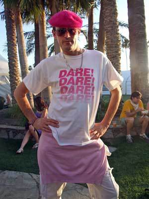 Mark Jones who owns the London-based label "Wall of Sound" shows that men can be pretty in pink and that fuzzy caps are never out. Bands: Kraftwerk and Prince