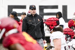 LOS ANGELES, CA - MARCH 21: Alex Grinch watches over practice during the USC spring practice.