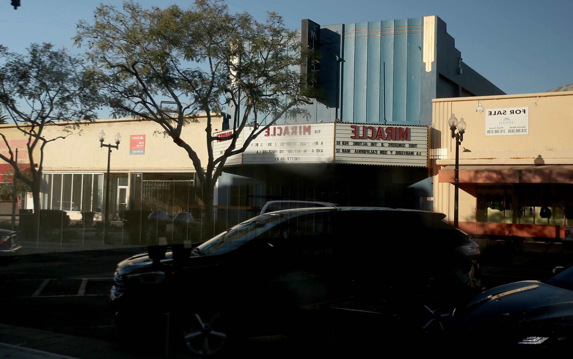 A sign reads "For Sale" on an Inglewood business