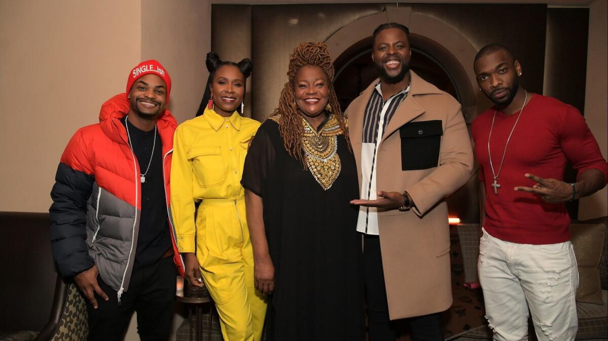 King Bach, from left, Sydelle Noel, Cora Pantin, Winston Duke and Jay Pharoah attend the MCM X GQ dinner the Restaurant at Montage Beverly Hills celebrating Duke as a 2018 breakout star on Wednesday.