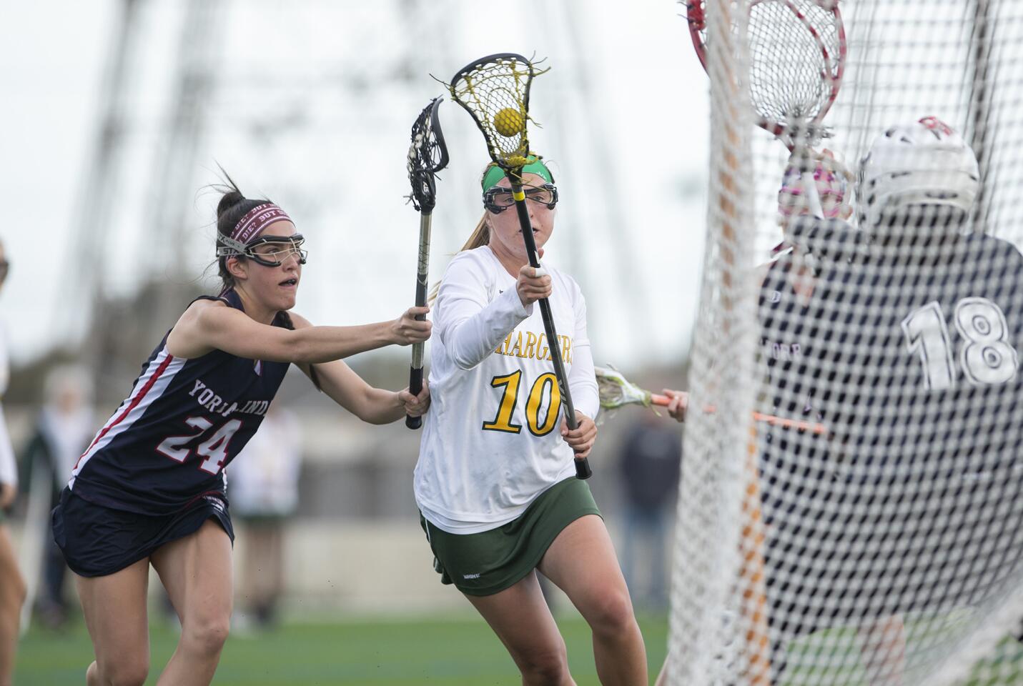 Edison High's Annie Cavener gets pressure from Yorba Linda's Miranda Sparkman in a nonleague game at home Thursday.