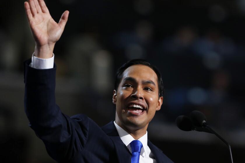 Keynote speaker and San Antonio, Texas Mayor Julian Castro waves while addressing the first session of the Democratic National Convention in Charlotte, North Carolina.