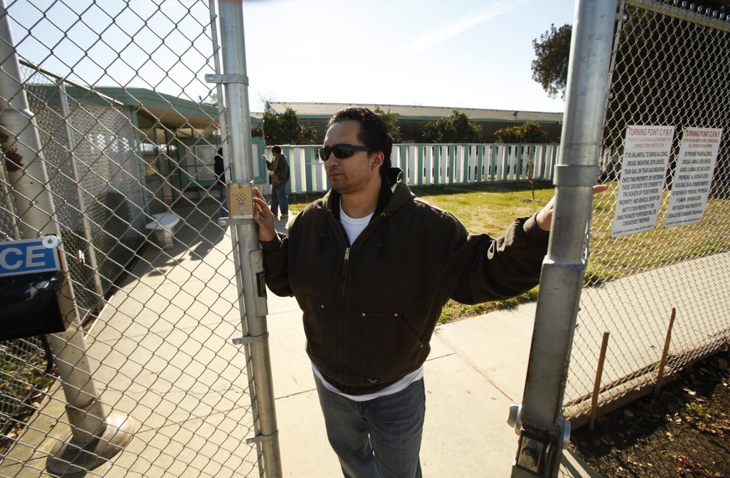Jara stands at the front gate to Rockhill Farm near Bakersfield. He founded and runs the nonprofit, whose aim is to rehabilitate drug addicts and felons.