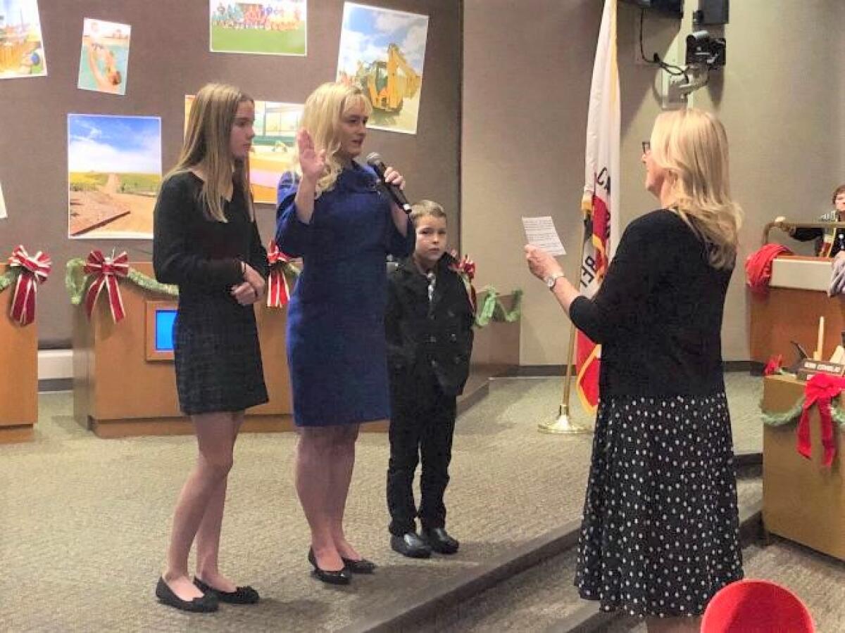 Jill Hardy is sworn in as Huntington Beach's mayor pro tem on Monday. She assumes the position vacated by new Mayor Lyn Semeta.