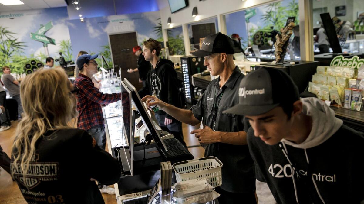 Customers at 420 Central, a marijuana dispensary in Santa Ana, on New Year's Day.