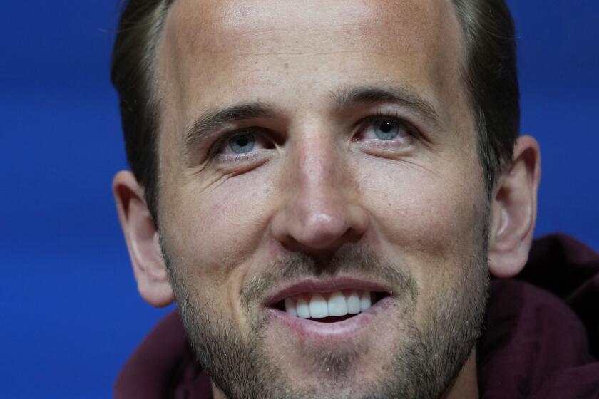 Bayern's Harry Kane attends a news conference in Munich, Germany, Tuesday, April 16, 2024, ahead of the Champions League quarter final second leg soccer match between FC Bayern Munich and Arsenal. (AP Photo/Matthias Schrader)