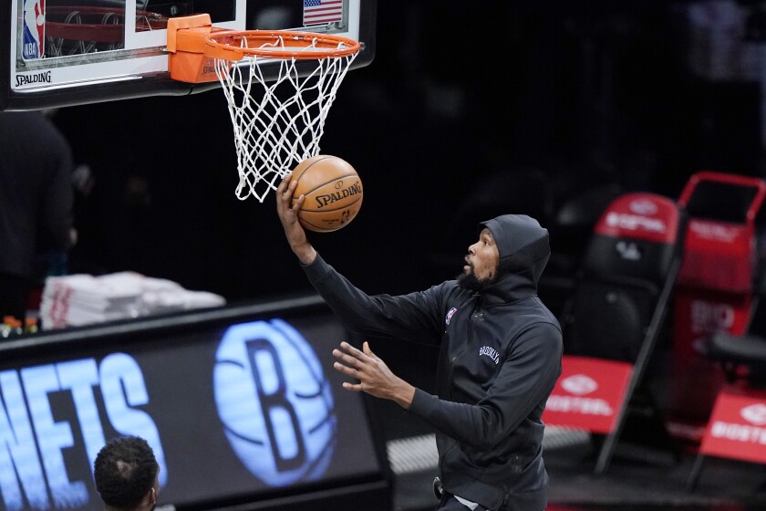 Brooklyn Nets forward Kevin Durant goes up for a shot during the first quarter of an NBA basketball game Sunday, Jan. 3, 2021, in New York. (AP Photo/Kathy Willens)