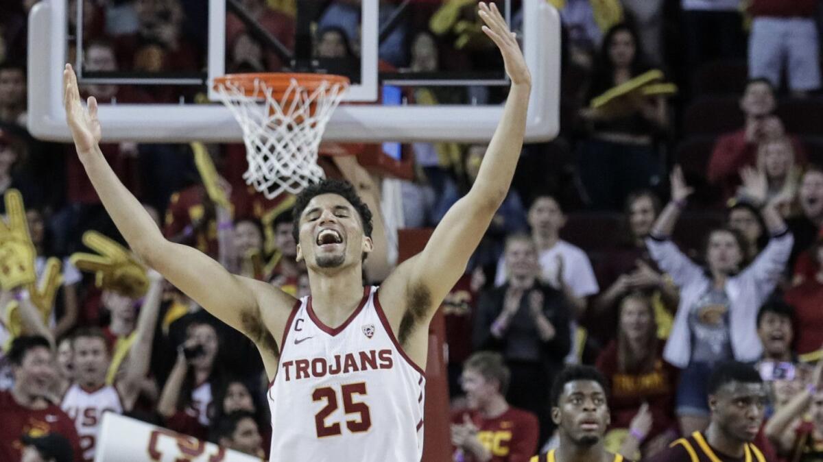 USC forward Bennie Boatwright celebrates after making a three-point shot in the closing seconds to beat Arizona State 69-67 at the Galen Center on Jan. 26.