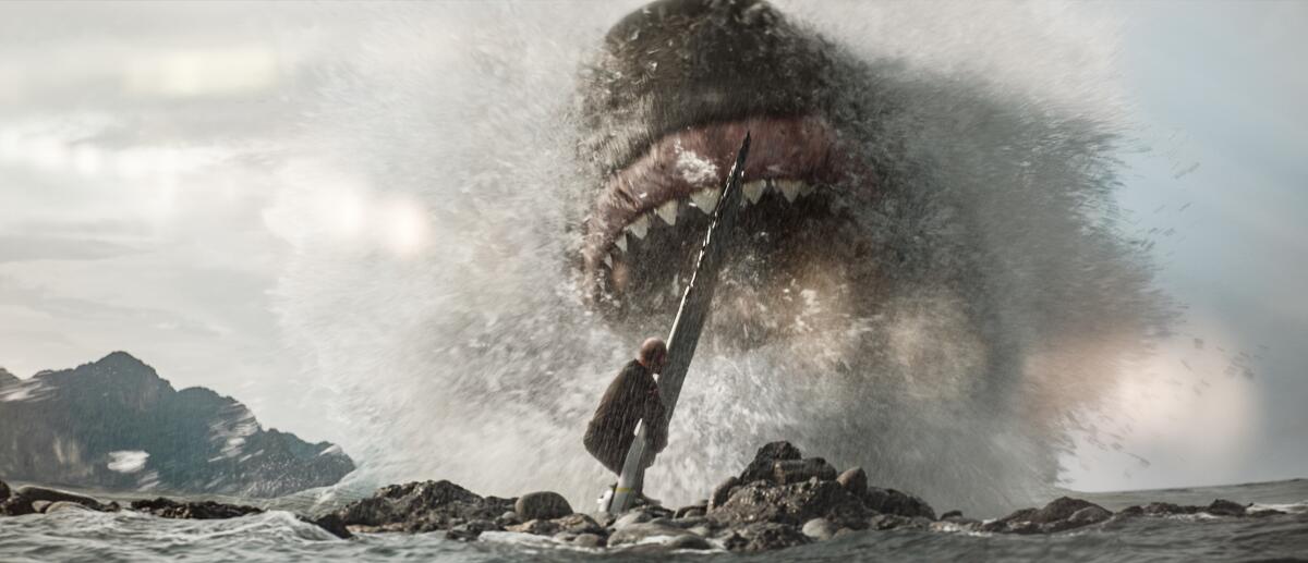 A lone man does battle with a giant sea creature