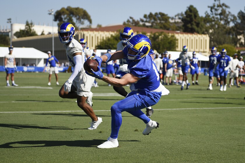 Los Angeles Rams wide receiver Cooper Kupp catches a pass for a touchdown in a red-zone drill during NFL football training camp practice in Irvine, Calif., Saturday, July 31, 2021. (AP Photo/Kelvin Kuo)