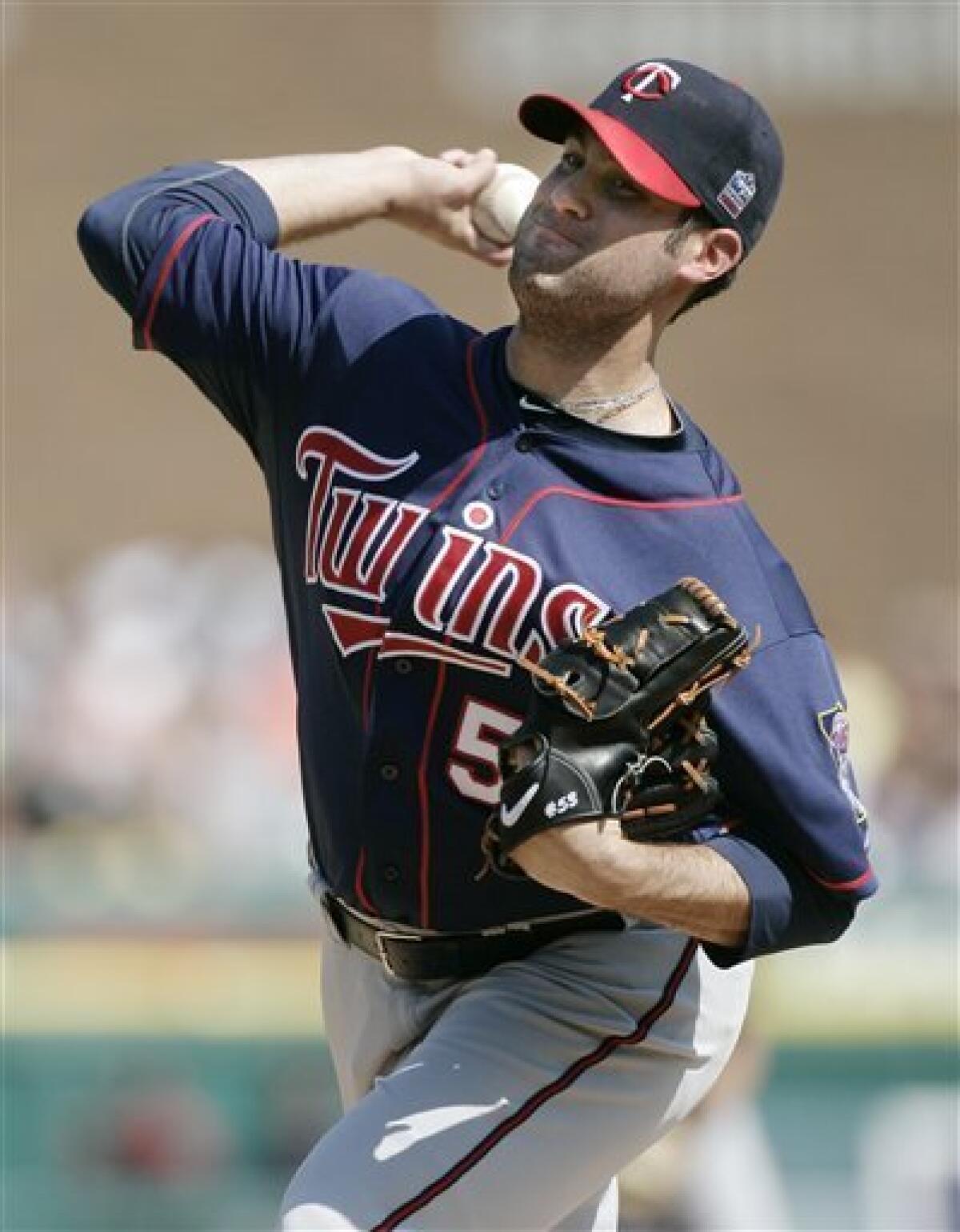 Joe Mauer's pinch-hit home run in seventh beats Detroit Tigers