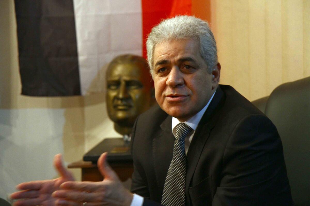 Egyptian presidential candidate Hamdeen Sabahi's campaign denied remarks attributed to him in an audio recording in which a person with a voice that sounds like his says he would put former army chief Abdel Fattah Sisi on trial for the deaths of hundreds of protesters.