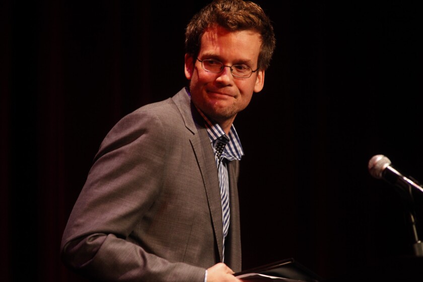Parents are protesting a couple of the books written by John Green, pictured in April receiving the Los Angeles Times Book Prize Innovator's Award.