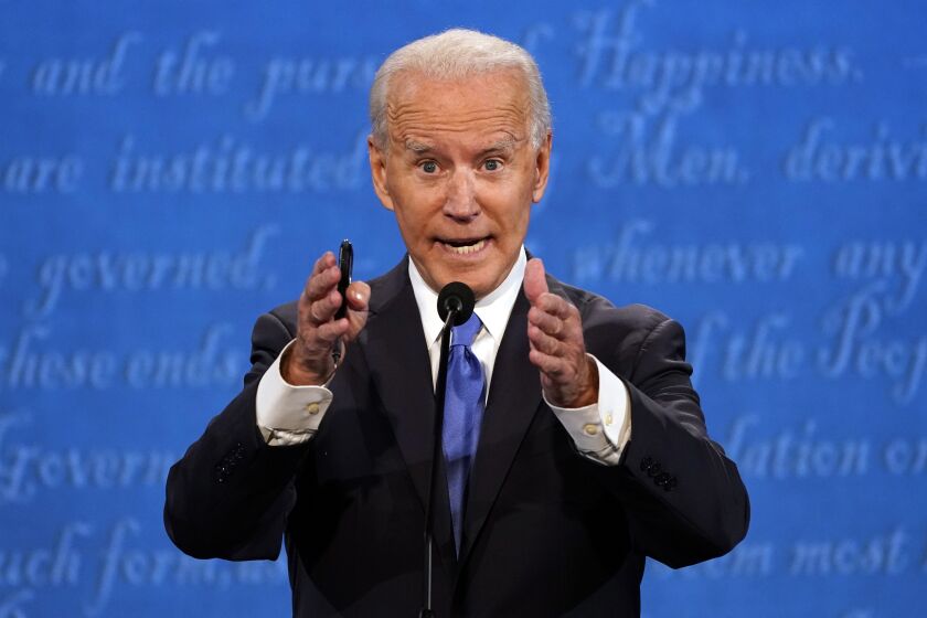 Democratic presidential candidate former Vice President Joe Biden speaks during the second and final presidential debate Thursday, Oct. 22, 2020, at Belmont University in Nashville, Tenn., with President Donald Trump. (AP Photo/Julio Cortez)