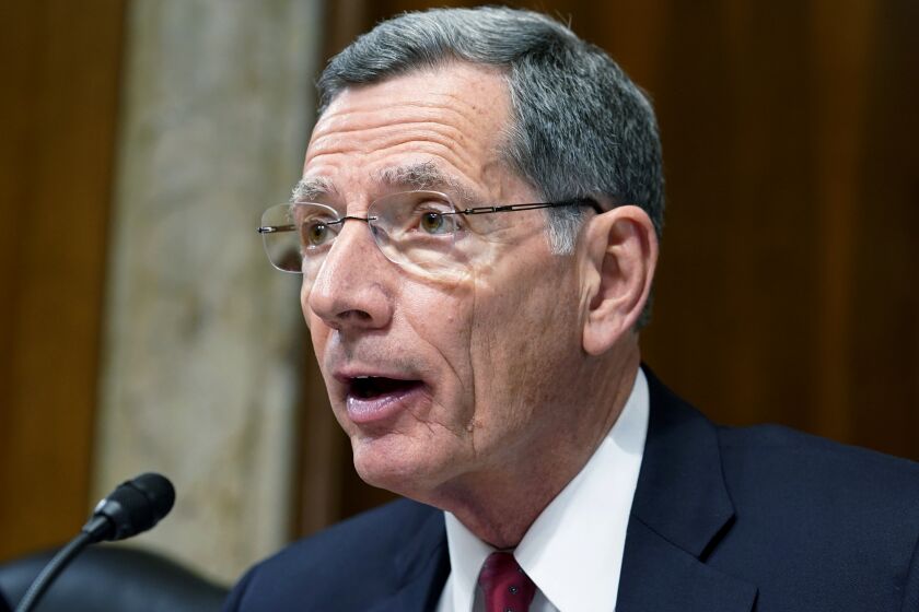 FILE - Sen. John Barrasso, R-Wyo., speaks during a Senate Energy and Natural Resources hearing, May 5, 2022, on Capitol Hill in Washington. Kentucky officials say they won't start paying out $21 million in economic incentives for a proposed electric vehicle battery facility until the company further explains why the U.S. Department of Energy abruptly rejected a $200 million loan for the project after some congressional Republicans argued the firm has improper ties to China. In February, Sen. Barrasso questioned whether the planned grant to Microvast would benefit China. Barrasso cited a company filing with the Securities and Exchange Commission in which Microvast said it may not be able to protect its intellectual property rights in China. (AP Photo/Mariam Zuhaib, file)