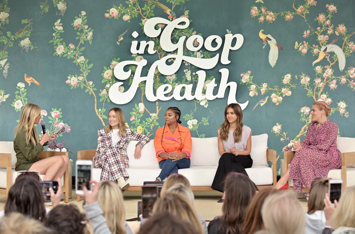 During a panel discussion, Goop founder Gwyneth Paltrow, from left, chats with Olivia Wilde, Taraji P. Henson, Jessica Alba and Busy Philipps about a number of topics from career reinvention to new abortion restrictions.