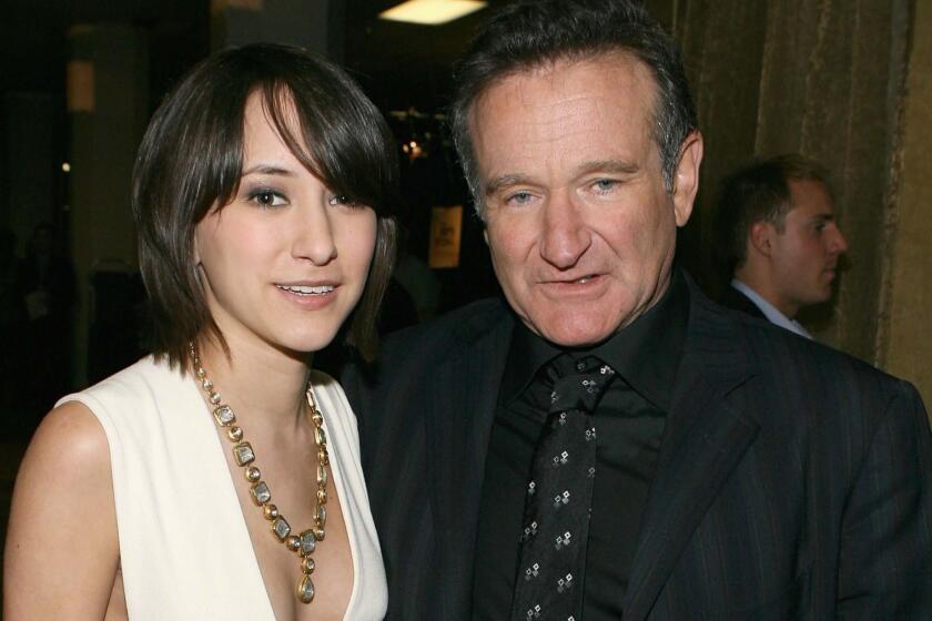 Zelda Williams and Robin Williams backstage during the People's Choice Awards at the Shrine Auditorium on Jan. 9, 2007, in Los Angeles.