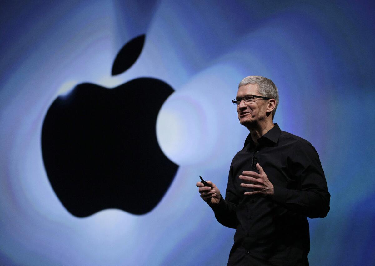 Apple CEO Tim Cook speaks at the introduction of the iPhone 5 in San Francisco in 2012. Apple has signed Sony Music to a streaming deal, setting the stage for an iRadio announcement on Monday.
