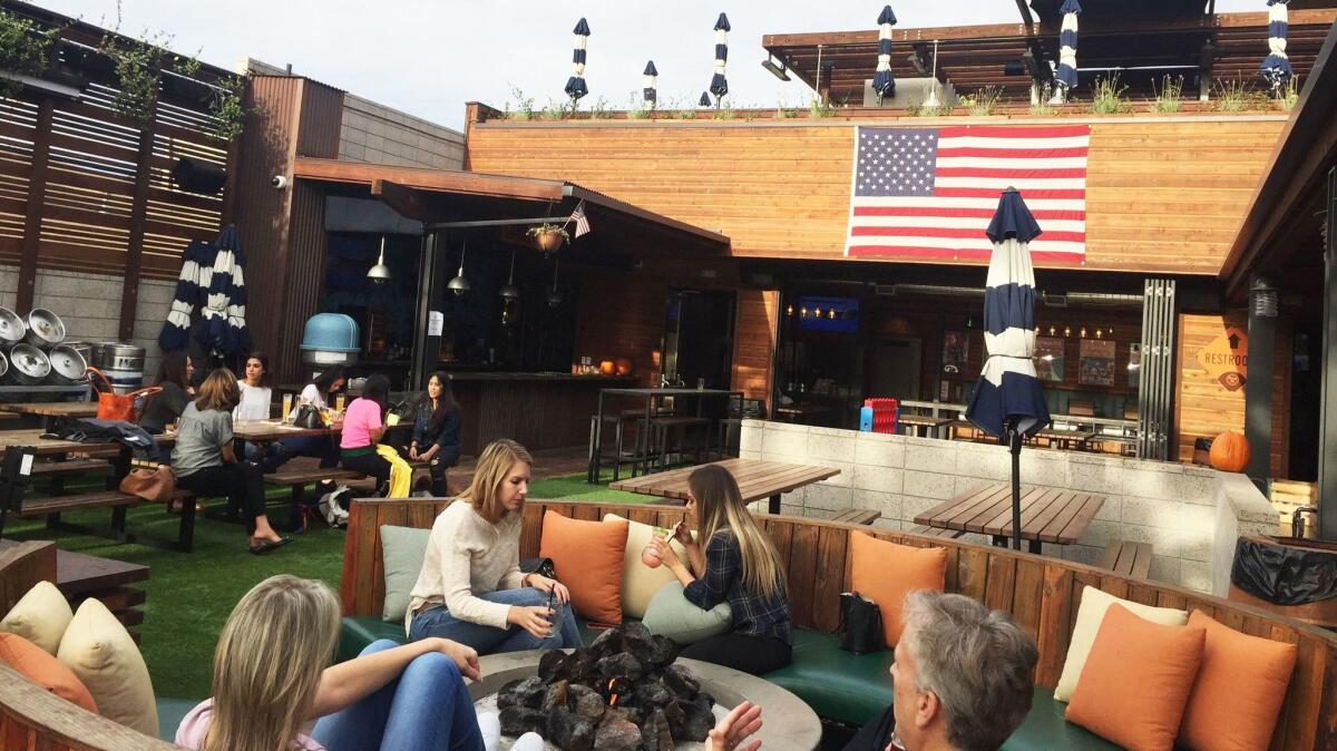 The central courtyard at Park 101, a four-in-one dining and drinking destination that opened July 4 in Carlsbad Village.