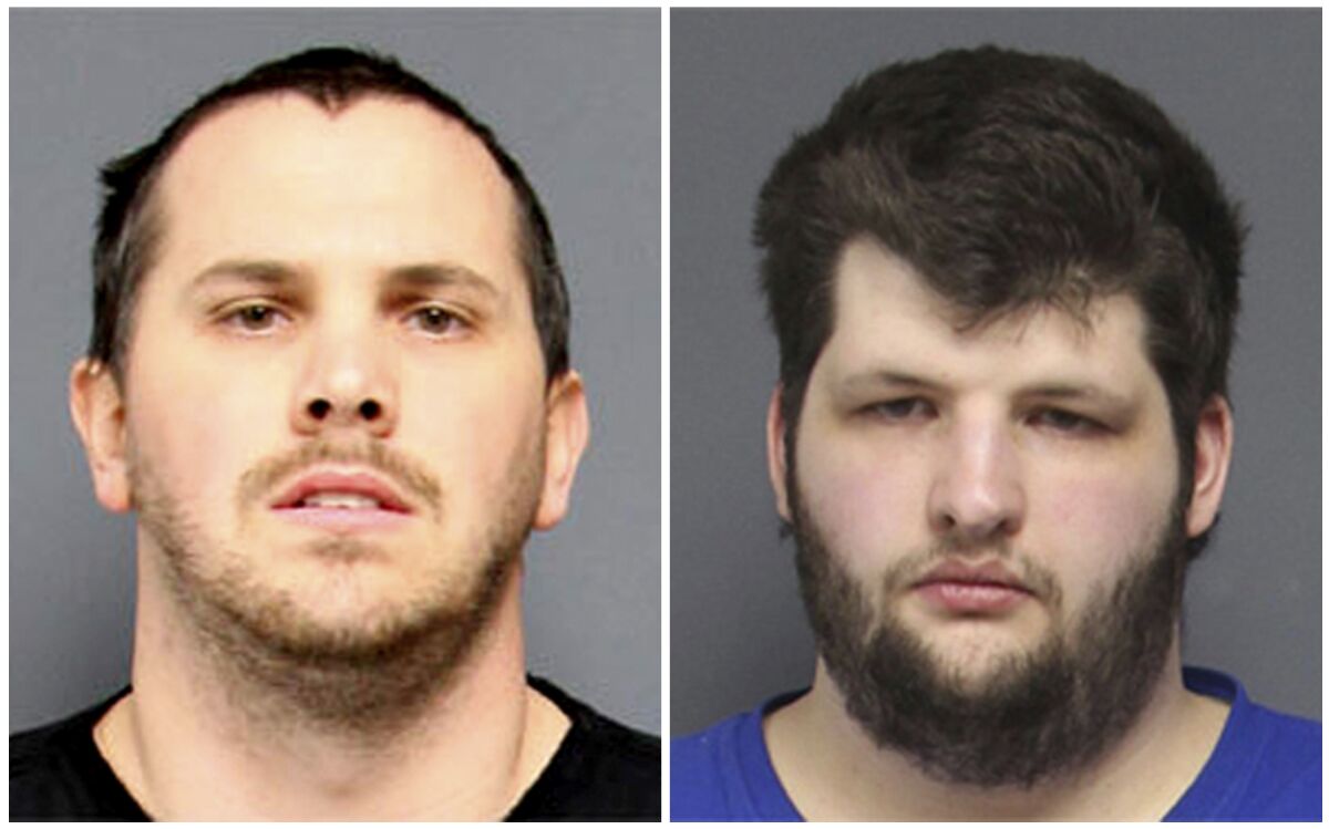 FILE - This combination of undated booking photos provided by the Pennsylvania Attorney General's Office shows, Brent Getz, left, and Gregory Wagner Jr. On Thursday, March 10, 2022, Getz, a former police chief, was jailed after a jury convicted him of raping a child and related offenses in a case that languished for several years after police first learned of the allegations. Codefendant Wagner Jr. pleaded guilty to child rape in November 2020 and agreed to testify against Getz. Both men await sentencing. (Pennsylvania Attorney General's Office via AP, File)