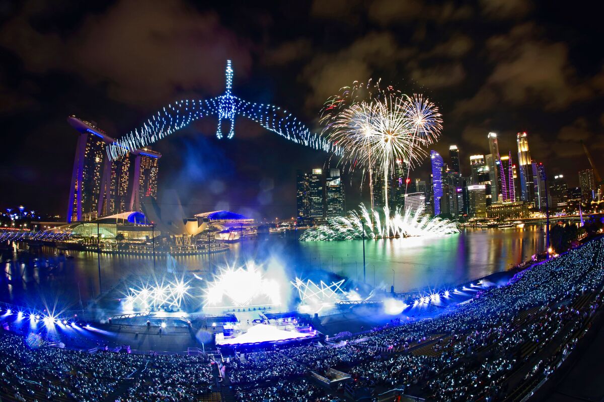 A drone-made crane appears to soar over the Singapore celebration.