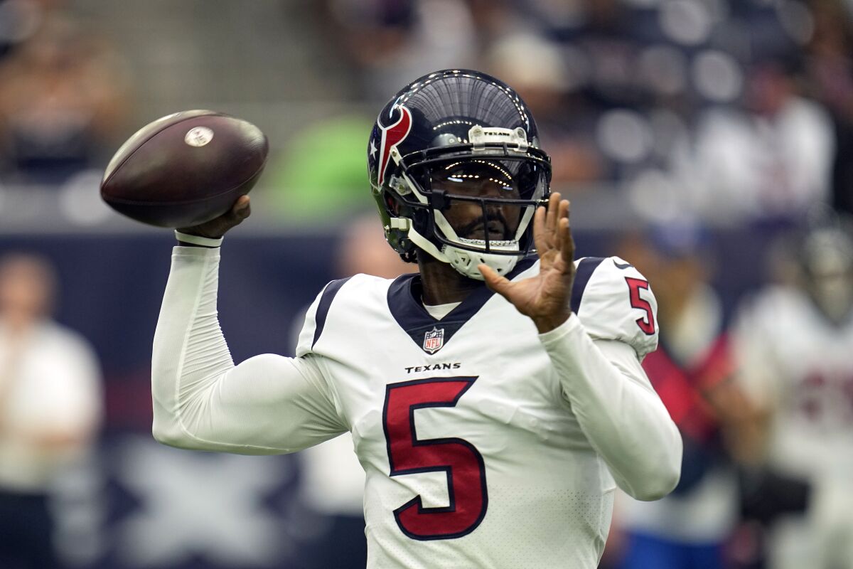 Houston Texans quarterback Tyrod Taylor (5) throws a pass against the Jacksonville Jaguars during the first half of an NFL football game Sunday, Sept. 12, 2021, in Houston. (AP Photo/Sam Craft)