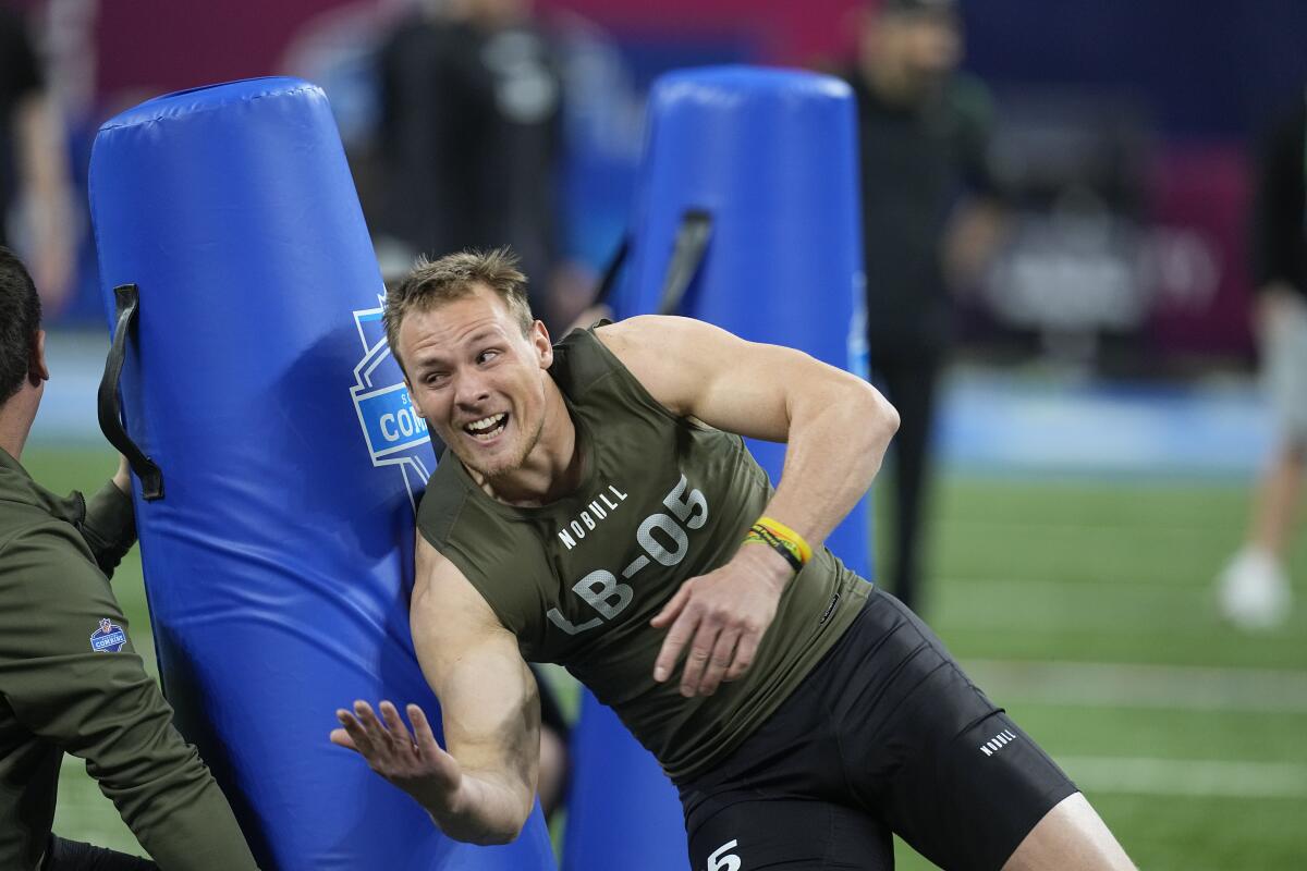 Iowa linebacker Jack Campbell runs a drill at the NFL scouting combine in March.
