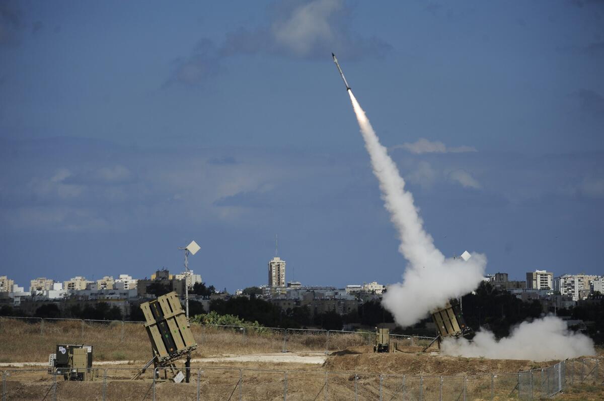 A missile is launched by an Iron Dome battery, a missile defense system designed to intercept and destroy incoming short-range rockets and artillery shells, in the southern Israeli city of Ashdod.