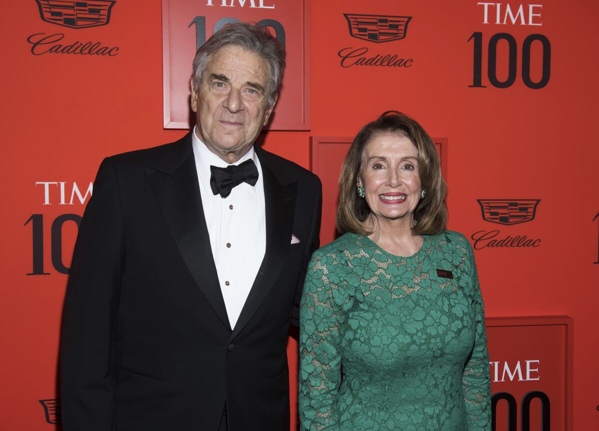 Paul Pelosi and Nancy Pelosi smile in formal wear at the Time 100 Gala in 2019.