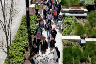 A rally outside of a Google Seattle office on April 16, protesting the tech giant's cloud computing contract with Israel.