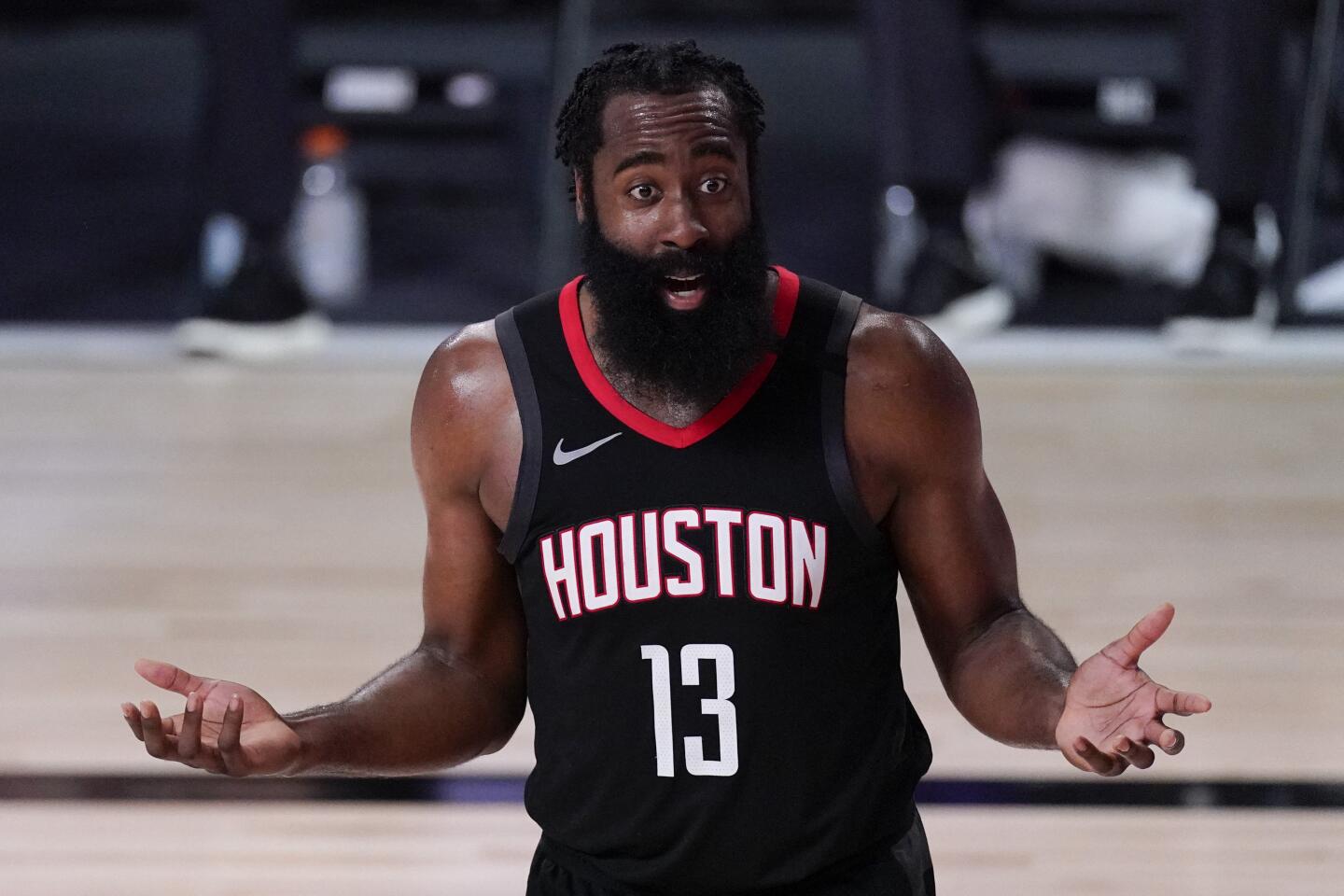 The Rockets' James Harden argues a second-half call Saturday against the Lakers.