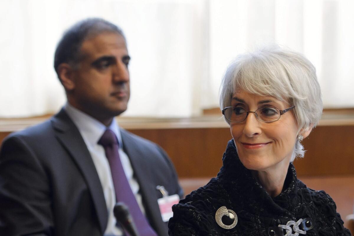 U.S. Undersecretary for Political Affairs Wendy Sherman smiles at the start of the two days of closed-door nuclear talks in Geneva on Tuesday.