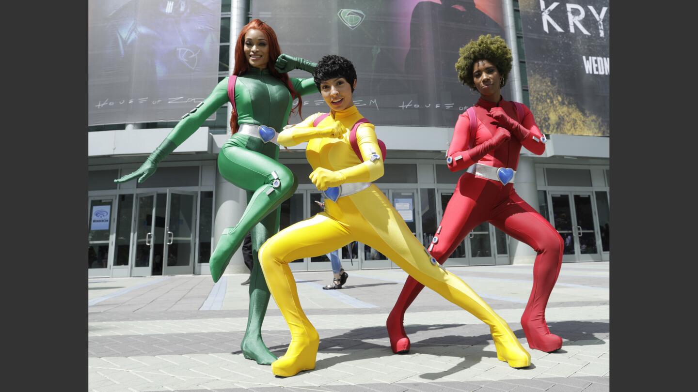 AWe spy "Totally Spies": Alicia Marie, left, Utahime and Krystina Arielle take on WonderCon at the Anaheim Convention Center.