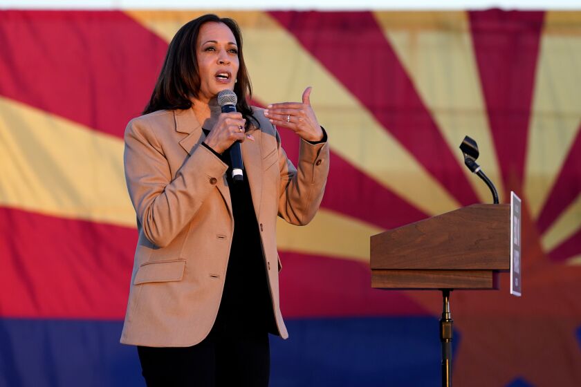 Democratic vice presidential candidate Sen. Kamala Harris, D-Calif., speaks at a mobile campaign event, Wednesday, Oct. 28, 2020, in Phoenix. (AP Photo/Matt York)