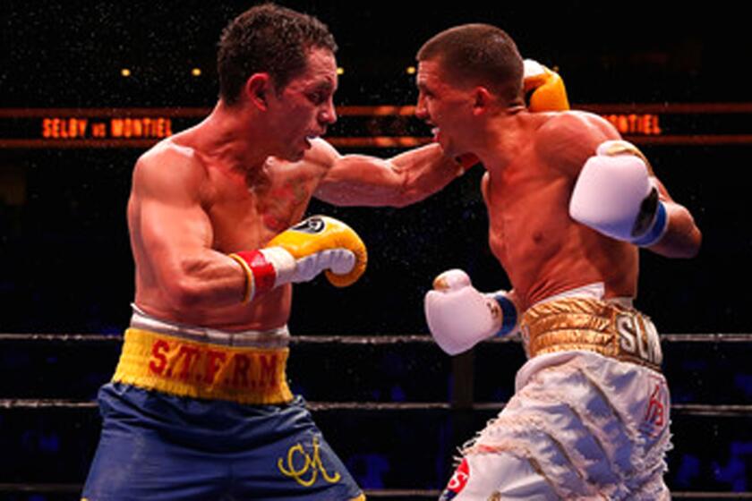 Fernando Montiel, left, trades punches with Lee Selby during a fight last year.