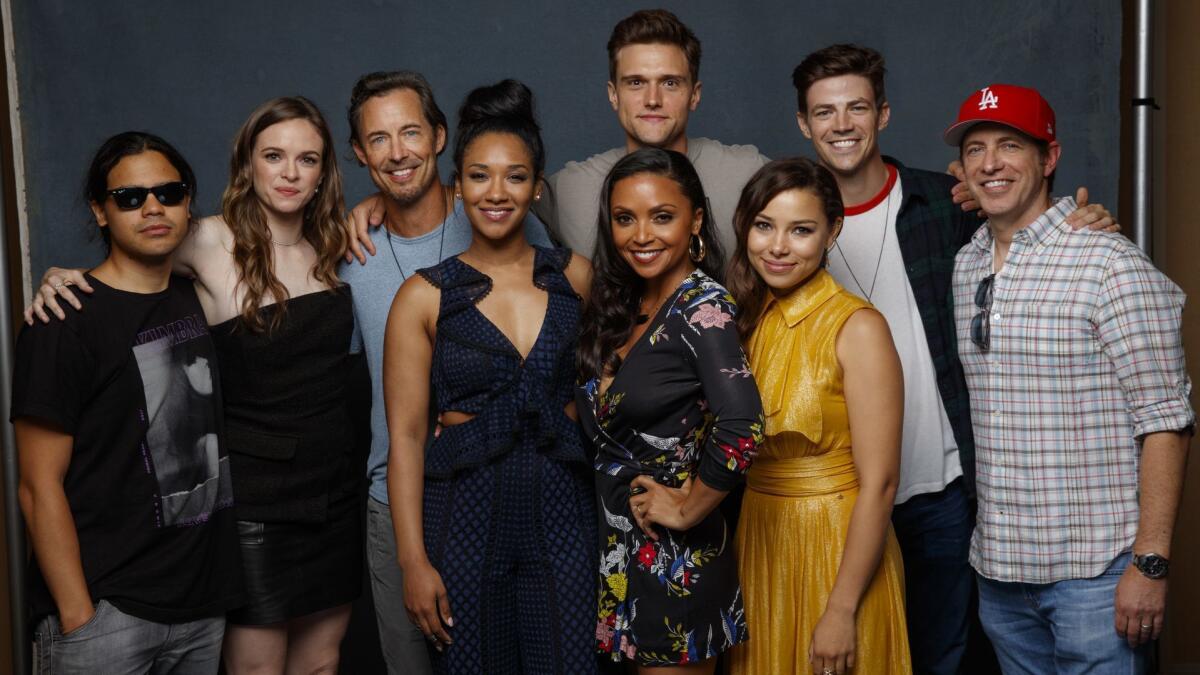 Carlos Valdes, Danielle Panabaker, Tom Cavanagh, Candice Patton, Danielle Nicolet, Hartley Sawyer, Jessica Parker Kennedy, Grant Gustin and Todd Helbing from the television series "The Flash."