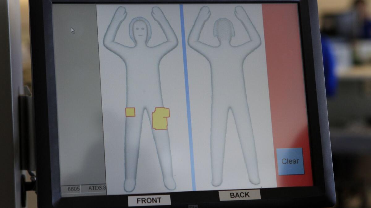 A full-body scanner with privacy software installed is used at Ontario International Airport.