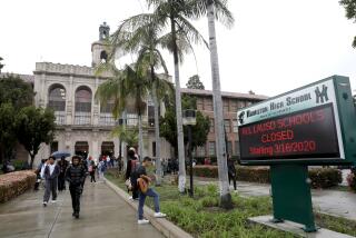 LOS ANGELES, CALIF. -- FRIDAY, MARCH 13, 2020: Hamilton High School in Los Angeles, Calif., on March 13, 2020. The school has 2,623 students who live in 94 different zip codes, some of whom travel upwards of 30 miles to school on 24 different school bus routes. 221 school staff live in 88 zip codes. Los Angeles Unified School District Superintendent Austin Beutner announced that schools will be closed due to the coronavirus. (Gary Coronado / Los Angeles Times)