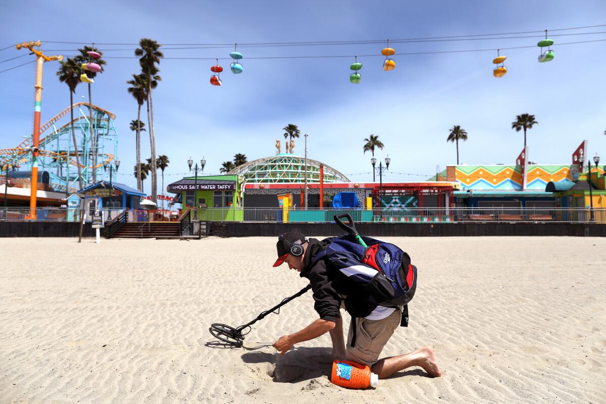 Beach Boardwalk sits empty, remaining closed to guests in Santa Cruz.