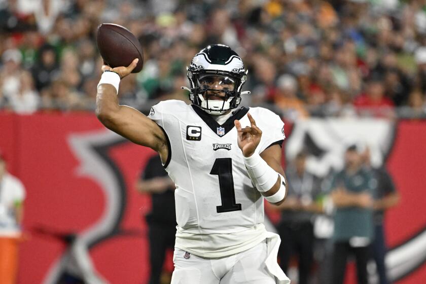 Philadelphia Eagles' Jalen Hurts passes during the first half of an NFL football game against the Tampa Bay Buccaneers, Monday, Sept. 25, 2023, in Tampa, Fla. (AP Photo/Jason Behnken)