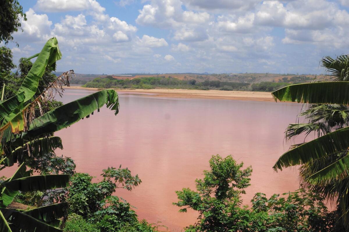 A mining waste spill has turned Brazil's Rio Doce a bright orange for a 300-mile stretch.