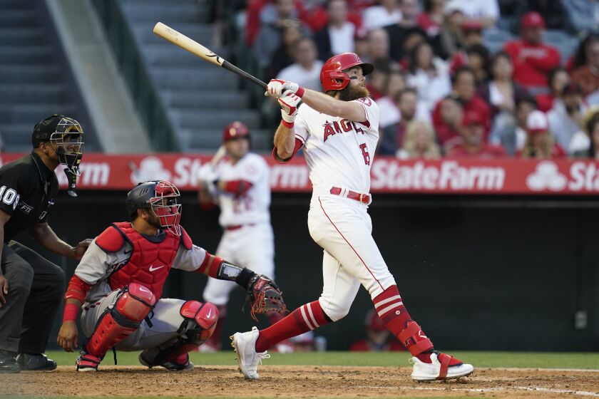 The Angels' Brandon Marsh hits a two-run home run during the fourth inning May 7, 2022.