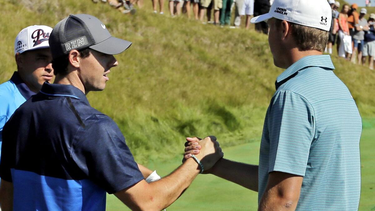 Jordan Spieth, right, greets Rory McIlroy at the seventh tee during a practice round for the PGA Championship on Tuesday at Whistling Straits