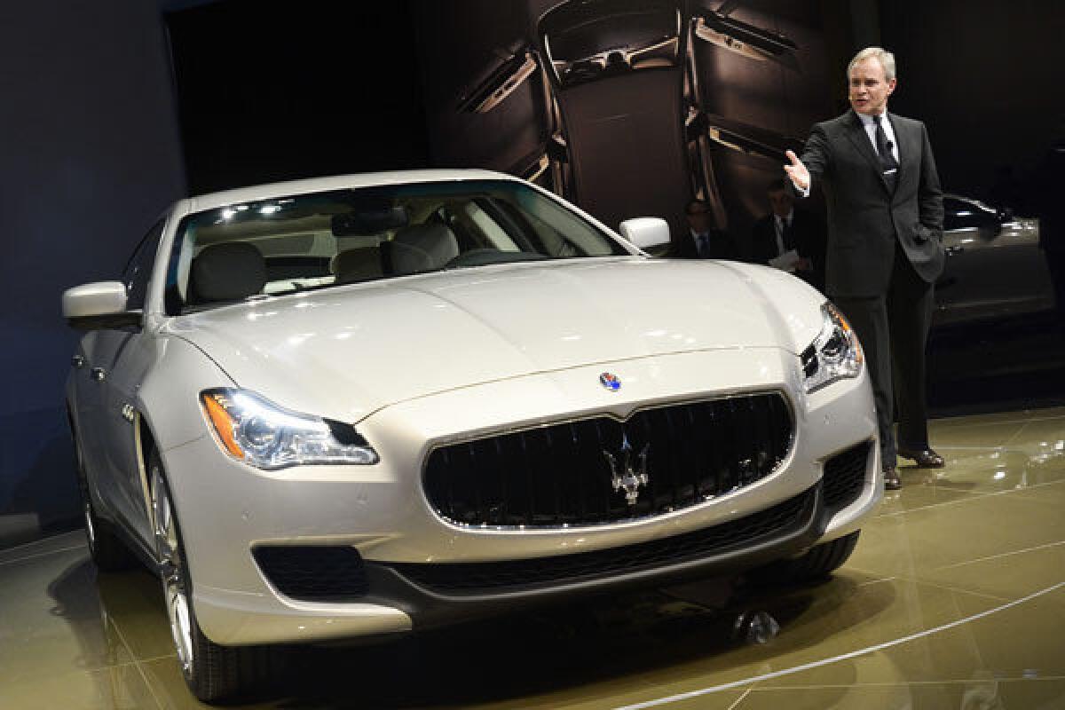 Harald J. Wester introduces the new Maserati Quattroporte sedan during the media preview at the North American International Auto Show in Detroit.