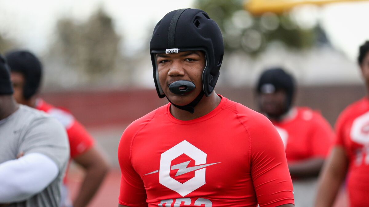 Calabasas defensive end Leshaun Bell looks on between drills at the Opening Los Angeles Regional on Feb. 10.