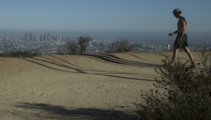 Vegetation is dry and sparse along a panoramic dirt trail in Runyon Canyon Park on Sept. 28. The California fire season is just beginning and with the tinder-dry brush and Santa Ana winds possible, the southland is prime for big brushfires.